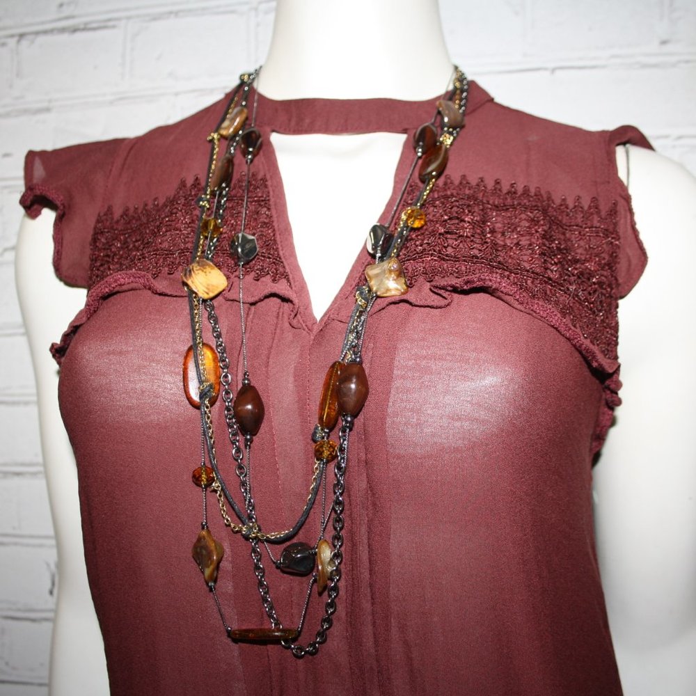 Stunning gunmetal and gold layered necklace with shells and amber beads